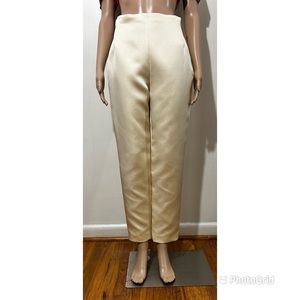 The Row slim leg pants in cream virgin wool (72%) and silk (28%) Side darts.